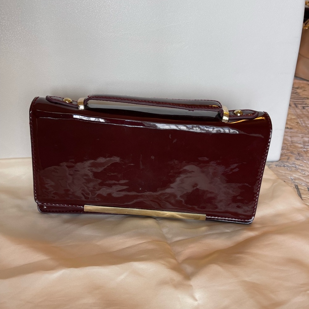 Deep Burgundy patent clutch